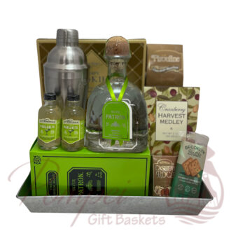 Wooden serving tray with Patron Silver Tequila, shaker, Margarita Mix, and snacks